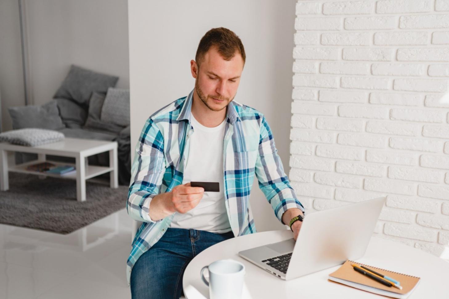 Person reviewing financial charts and seasonal expense tracking